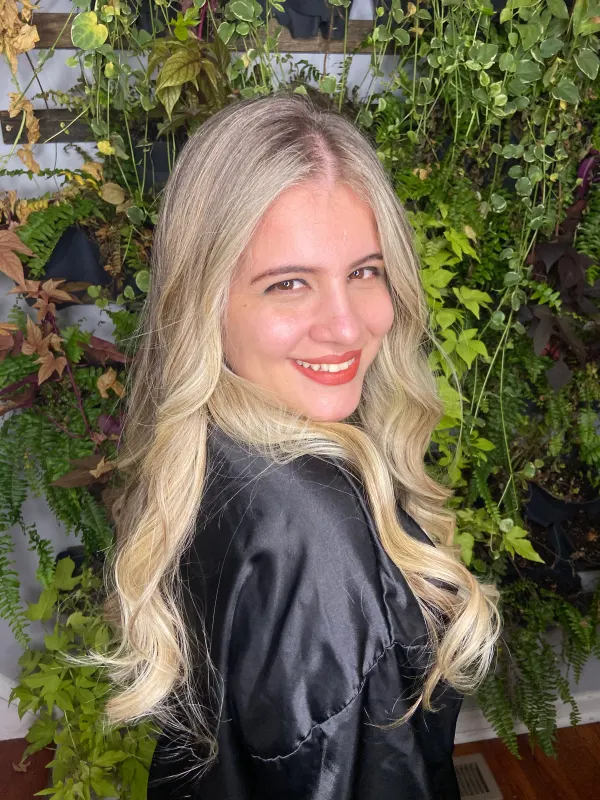 Beach waves in a bright blonde, set to fall open rather than curl tight