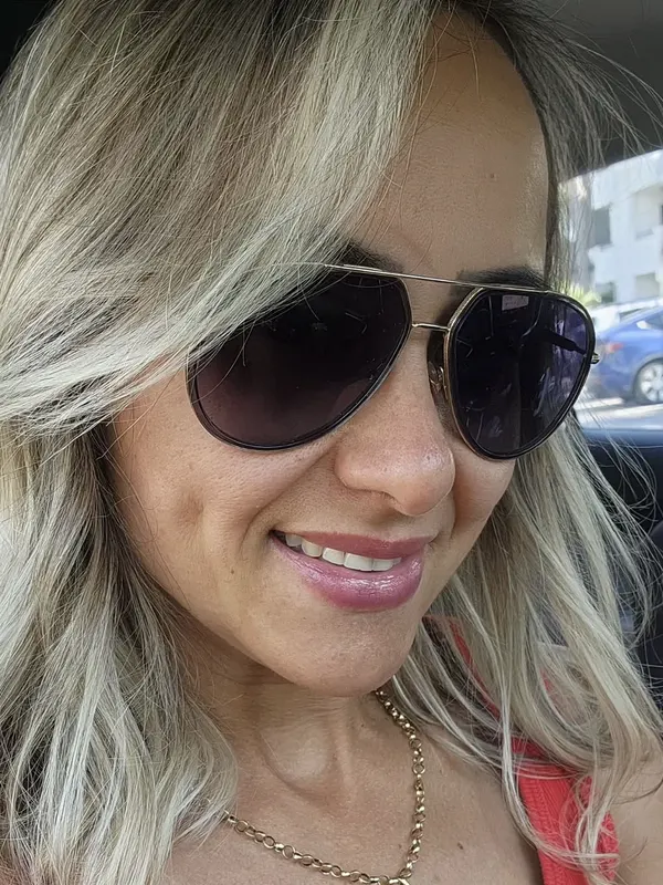 Blonde face framing highlights, the way the client wore them out of the salon