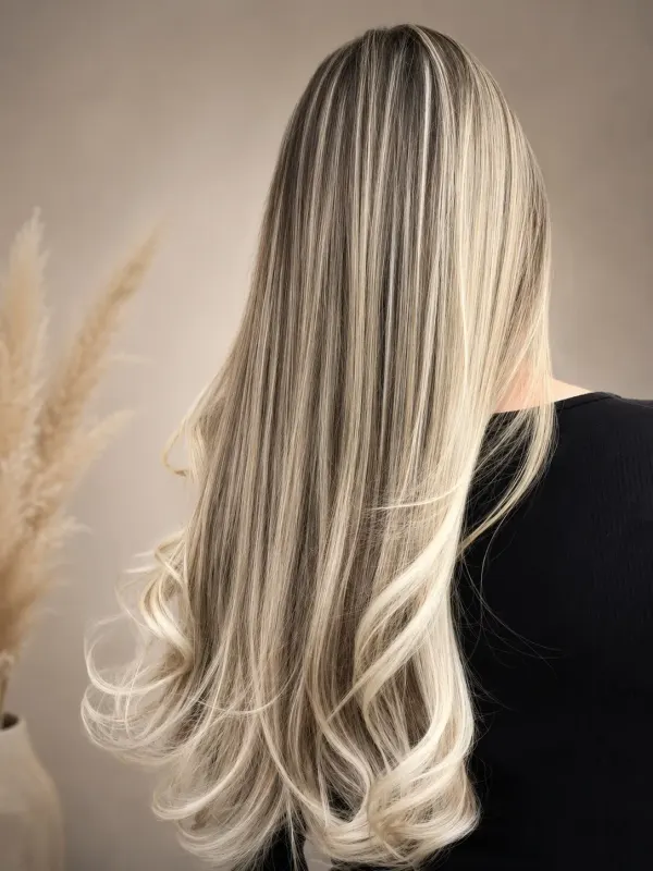 Icy blonde carried the full length, seen from behind
