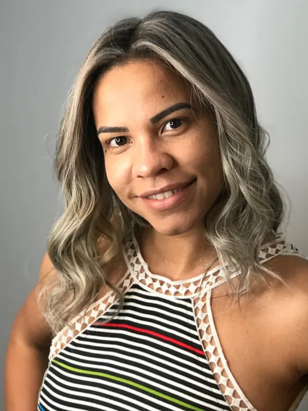 Icy blonde against a near black root, kept cool so it never turns brassy