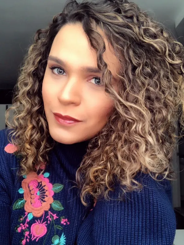 Curls cut dry and shaped to keep their definition as they dry